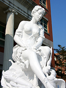 White statue before Humanities and Management Building