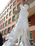 White statue in front of Humanities and Management Building