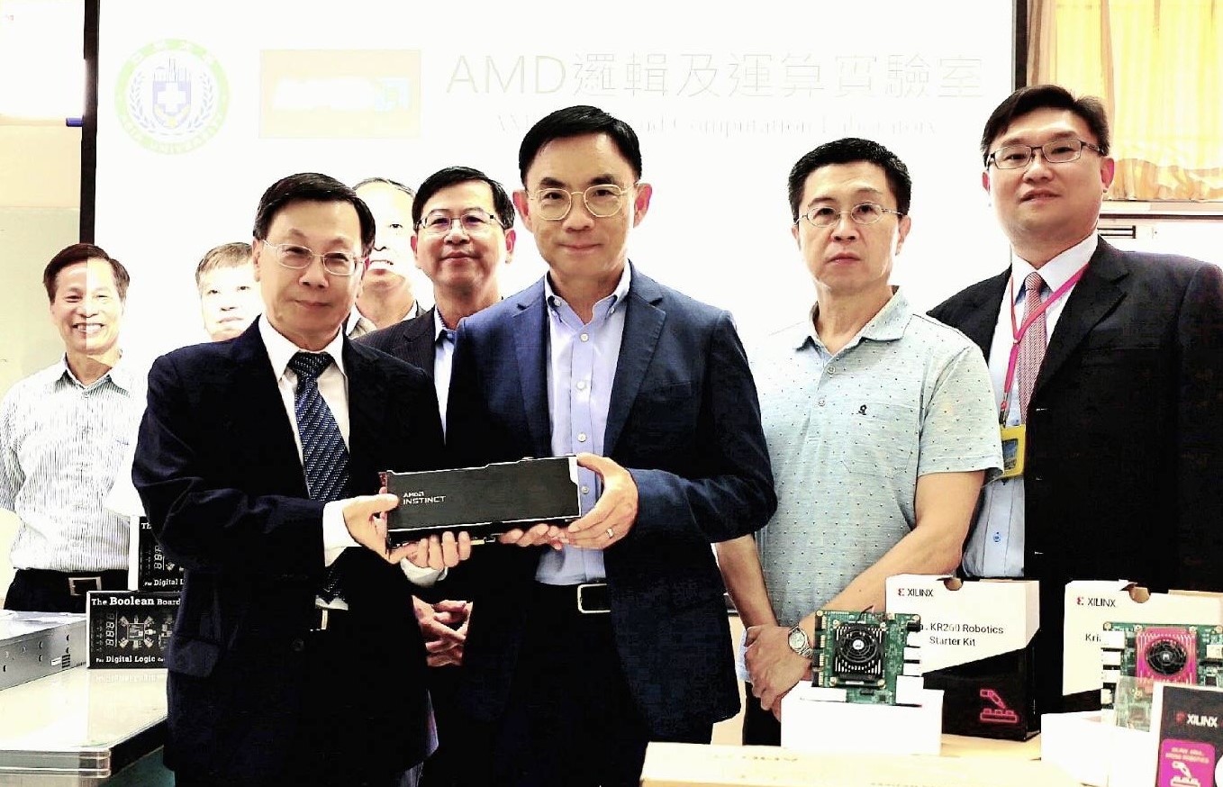 AMD's Senior VP, David Wang (front row, 2nd from the left ), represented AMD in donating cutting-edge equipment: the Kria kr260 robotics starter kit and the Kria kv260 vision AI kit. President Jeffrey J.P. Tsai (front row, 1st from the left) accepted the donation on behalf of Asia University, strengthening a valuable partnership