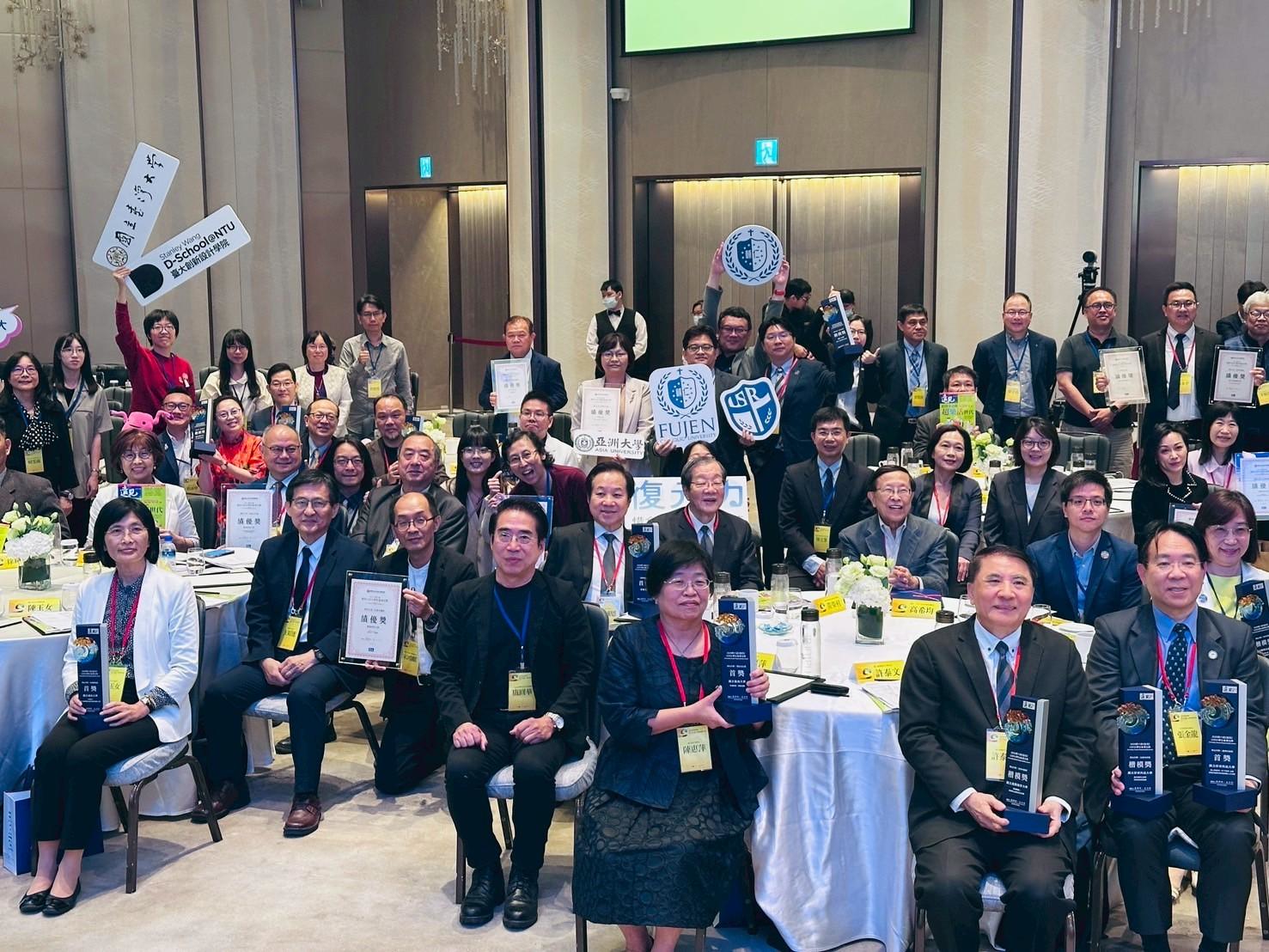 Group photo of all 2025 USR Award winners at the ceremony
