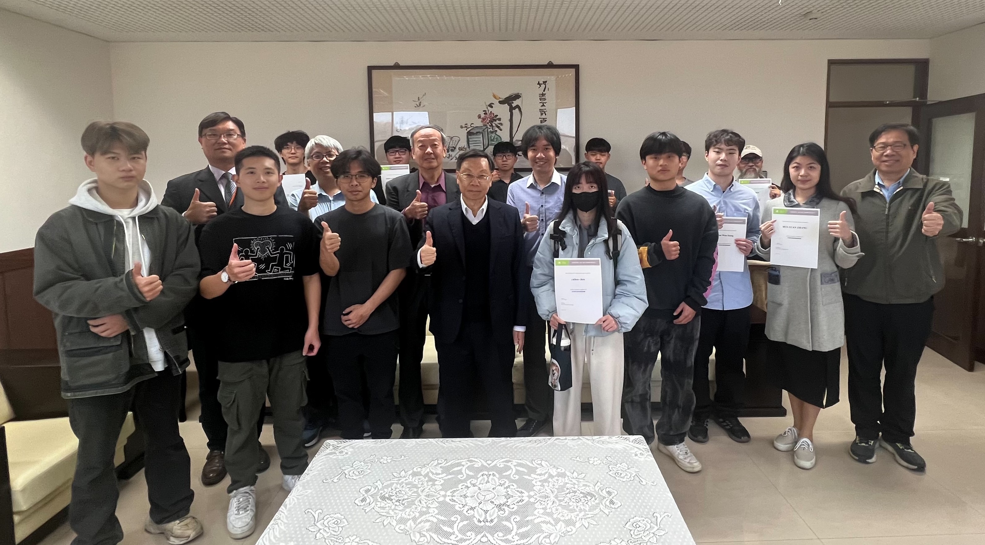 President Tsai (front row, 4th from left) with faculty and students from the College of Information and Electrical Engineering who earned NVIDIA certifications